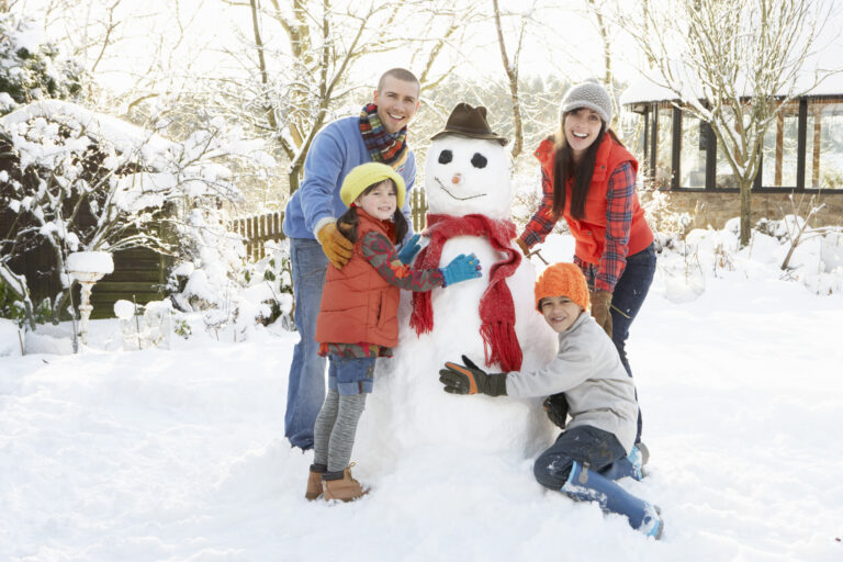 seasonal injuries, family playing in the snow